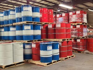 3 Layers of material barrels stacked in a warehouse